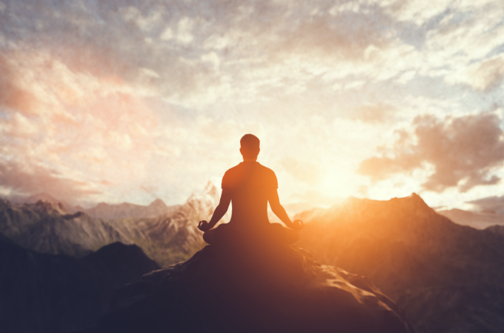 man-in-yoga-pose-zen-meditation-at-sunset-2021-09-02-06-48-07-utc